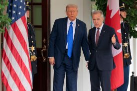 Canadian Prime Minister Mark Carney (right) and U.S. President Donald Trump outside the White House in Washington on Oct. 7, 2025.