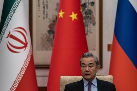 Chinese Foreign Minister Wang Yi speaks during a meeting on the Iranian nuclear issue in Beijing.