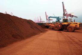 Rare-earth minerals are loaded for export to Japan at a port in Lianyungang, in China's Jiangsu province, on Sept. 5, 2010.