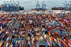 Containers and ships are seen at a port in Qingdao, China.