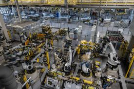 Robotic arms assemble vehicle frames on the production line for electric vehicle maker Zeekr at its factory in Ningbo, China, on May 29, 2025.