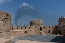 Smoke rises after an explosion in the industrial zone, caused by debris after interception of a drone by air defence in Fujairah, United Arab Emirates, on March 5.