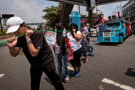 Transport workers and activists take part in a protest as they stage a strike over surging fuel costs in Manila, Philippines, on March 27.