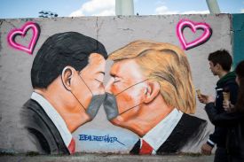 Street art shows U.S. President Donald Trump and Chinese President Xi Jinping at a section of the former Berlin Wall at Mauerpark in Berlin.