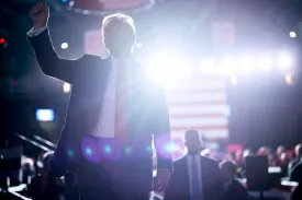 Republican presidential nominee, former President Donald Trump pumps his fist as he walks off stage at the end of a campaign rally at the Santander Arena on November 04, 2024 in Reading, Pennsylvania.