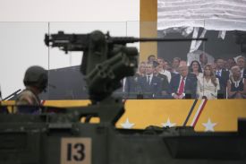President Donald Trump watches the 250th birthday parade of the U.S. Army in Washington, D.C.
