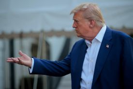 U.S. President Donald Trump speaks to reporters before boarding the Marine One presidential helicopter and departing the White House in Washington, D.C., on June 25.