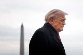 U.S. President Donald Trump speaks to reporters before boarding Marine One at the White House in Washington on Dec. 13, 2025.