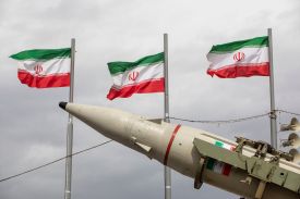 Missiles produced by Iran's armed forces are displayed near a row of Iranian flags during commemorations to mark the anniversary of the 1979 Iranian Revolution on Feb. 11 in Tehran.