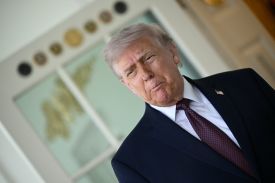 U.S. President Donald Trump speaks to the press outside the Oval Office at the White House in Washington on April 13.