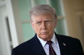 U.S. President Donald Trump speaks to the press outside the Oval Office at the White House in Washington on April 13.