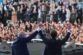 French President Emmanuel Macron and Armenian Prime Minister Nikol Pashinyan acknowledge the crowd after an event in Gyumri, Armenia, on May 5.