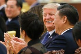 U.S. President Donald Trump and Chinese President Xi Jinping, right, attend a state dinner at the Great Hall of the People in Beijing.