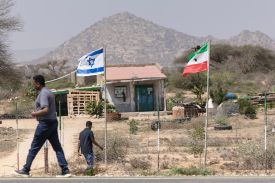 Flags of Israel and Somaliland fly alongside each other at the entrance to a fruit farm between the capital city of Hargeisa and Port city of Berbera in Somaliland on February 19.