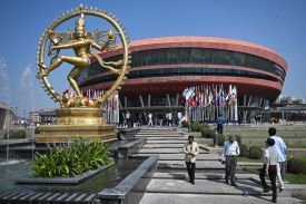 Visitors arrive to attend the AI Impact Summit at the Bharat Mandapam in New Delhi, India, on Feb. 17.