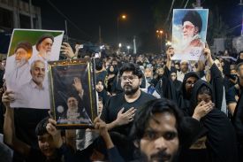 Shiite Muslims hold portraits of late Iranian Supreme Leader Ayatollah Ali Khamenei during a Matam procession in New Delhi, India, on March 10.