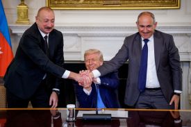 U.S. President Donald Trump joins hands with Azerbaijani President Ilham Aliyev and Armenian Prime Minister Nikol Pashinyan during a signing ceremony in the White House on August 8, 2025.