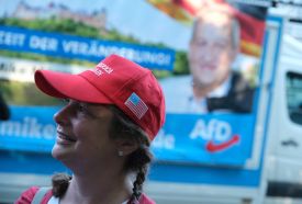 A woman wearing a "Make America Great Again" cap attends a campaign rally of the right-wing Alternative for Germany (AfD) in Görlitz, eastern Germany, on May 23, 2019.