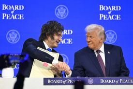 Argentine President Javier Milei shakes hands with U.S. President Donald Trump at a meeting of Trump’s “Board of Peace” during the World Economic Forum annual meeting in Davos, Switzerland.