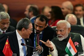 Chinese Premier Li Qiang talks with Indian Prime Minister Narendra Modi at the BRICS summit in Rio de Janeiro, Brazil, on July 7, 2025.