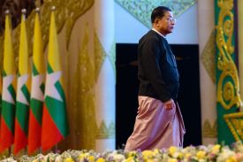 Myanmar Senior Gen. Min Aung Hlaing prepares to deliver a speech at the Myanmar International Convention Center in Naypyidaw, Myanmar, on March 28.