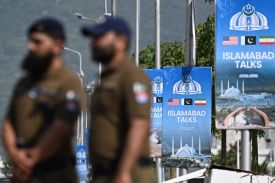 Security officers stand guard near the Serena Hotel in Islamabad on April 21, amid heightened security measures ahead of anticipated U.S.-Iran talks.