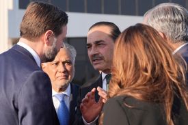 U.S. Vice President J.D. Vance talks to Pakistan Army chief Asim Munir and Foreign Minister Ishaq Dar before boarding Air Force Two after attending talks with Iran in Islamabad on April 12.