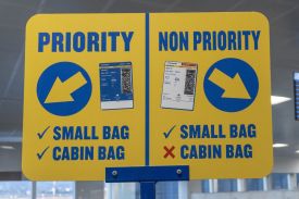 Sign separating priority passengers at boarding at Palermo airport in Sicily, Italy on 14 May 2024.