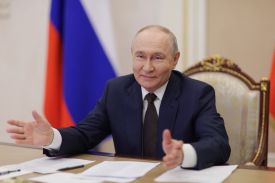 Russian President Vladimir Putin takes part via videoconference from Moscow.