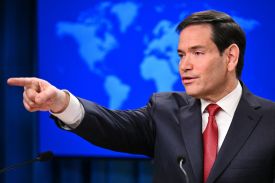 U.S. Secretary of State Marco Rubio gestures as he speaks during an end-of-year press conference in the State Department Press Briefing Room in Washington, DC on December 19, 2025.