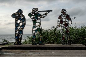 The Three Soldiers, a public art installation commemorating generations of troops once stationed along Taiwan’s rugged northeastern coastline, is seen in Linshan Cape Beach, northern Taiwan.