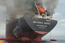 This handout photo released by the Royal Thai Navy shows smoke rising from the Thai bulk carrier Mayuree Naree near the Strait of Hormuz after an attack on March 11.