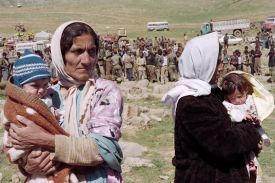 Iraqi Kurdish refugees gather in a camp in Zakho, Iraq.
