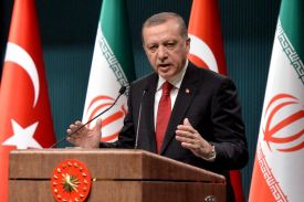 Turkish President Recep Tayyip Erdogan speaks as he gestures during a joint press conference with Iranian counterpart Hassan Rouhani in Ankara, on April 16, 2016.