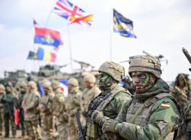 Soldiers from various NATO allies take part in a military exercise at the Smardan Training Area in Smardan, Romania, on Feb. 19.