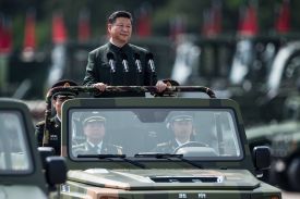 Chinese President Xi Jinping inspects People's Liberation Army soldiers at a barracks in Hong Kong on June 30, 2017.