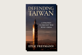 The book cover for "Defending Taiwan" by Eyck Freymann. The title is written in large gold serif font at the top against a dark, cloudy sky. The central image features the a Taipei skyscraper against a twilight city skyline with mountains in the distance. Small white text to the right of the tower reads, "A STRATEGY TO PREVENT WAR WITH CHINA," and the author's name is printed at the bottom.